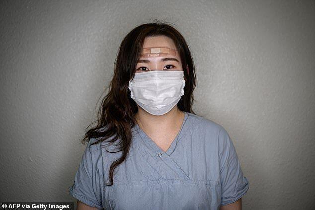 Kim Min-su is one of the nurses at Keimyung University Daegu Dongsan Hospital who wears patches to protect her forehead from her protective gear